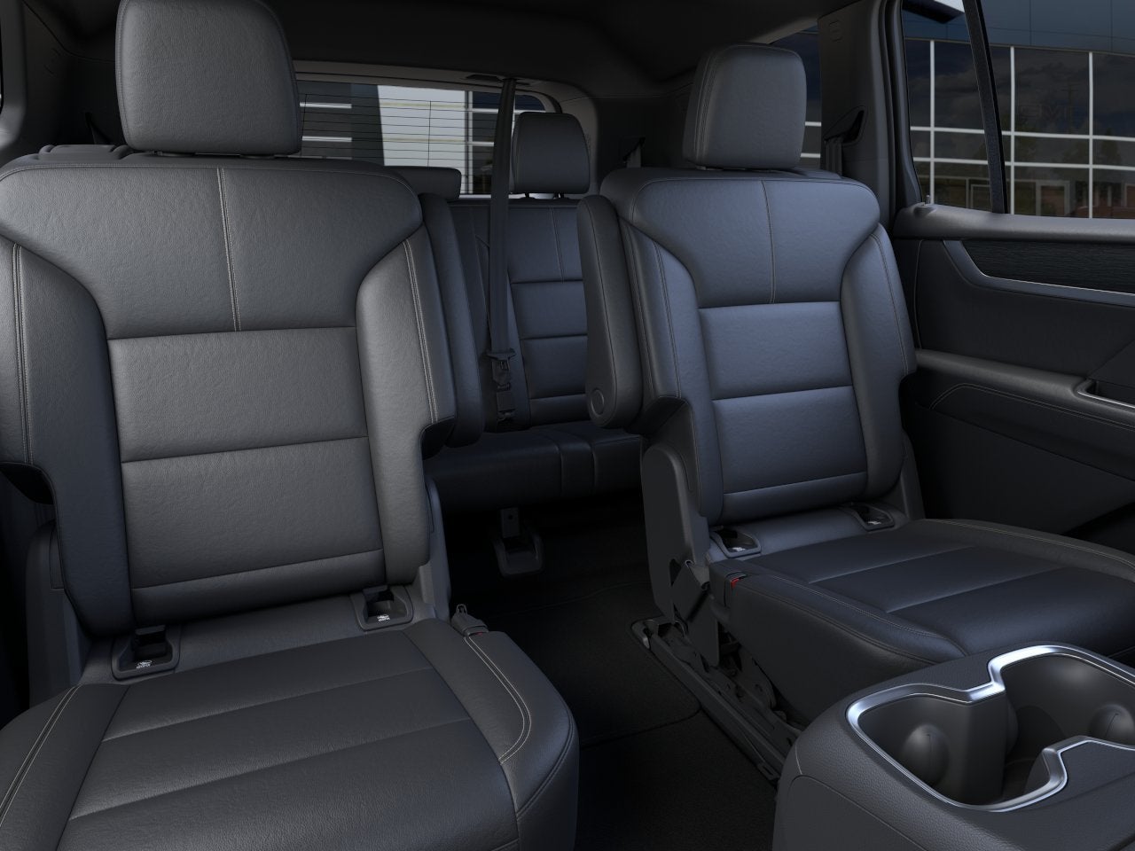 2026 GMC Acadia Elevation in Volcanic Red Tintcoat — front three-quarter view