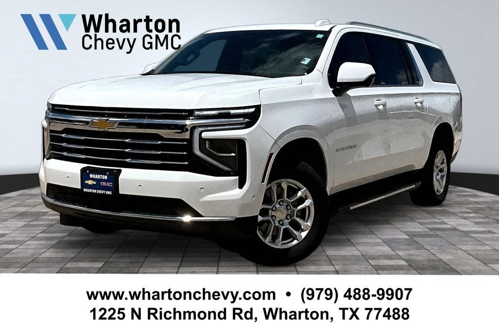 2025 Chevrolet Suburban LT in Summit White — front three-quarter view
